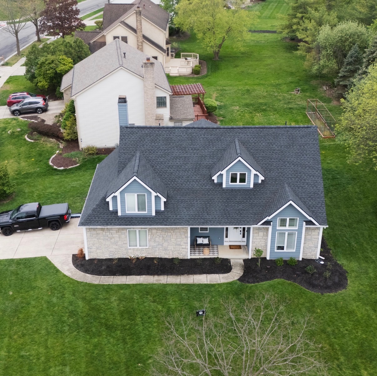 Cape-cod home with new roof - front view