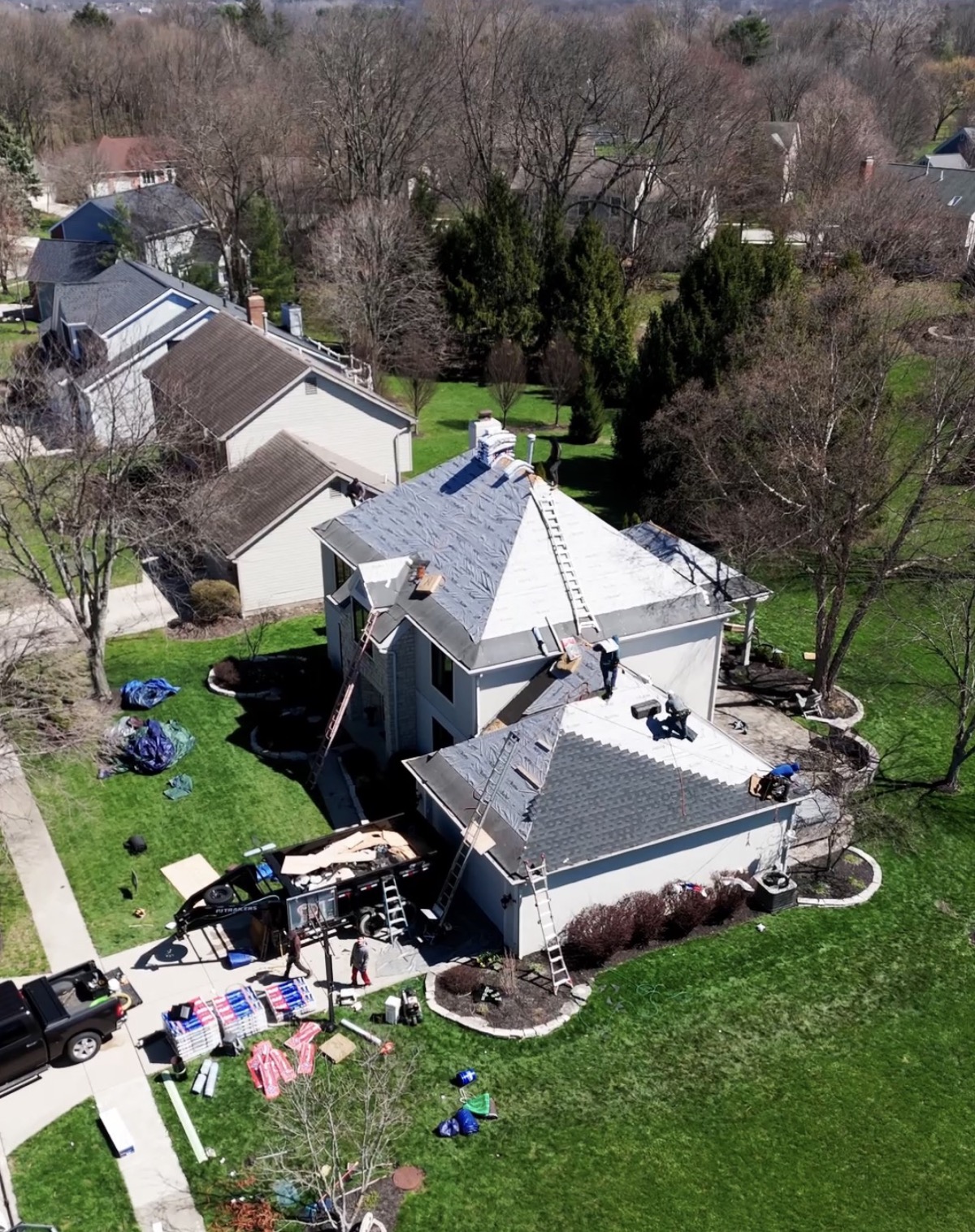 Hugo Builders crew working on roof