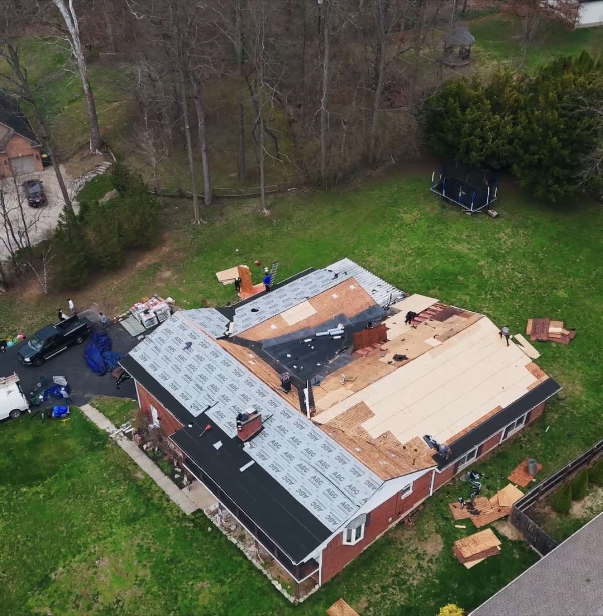 Roof repair in progress after storm damage